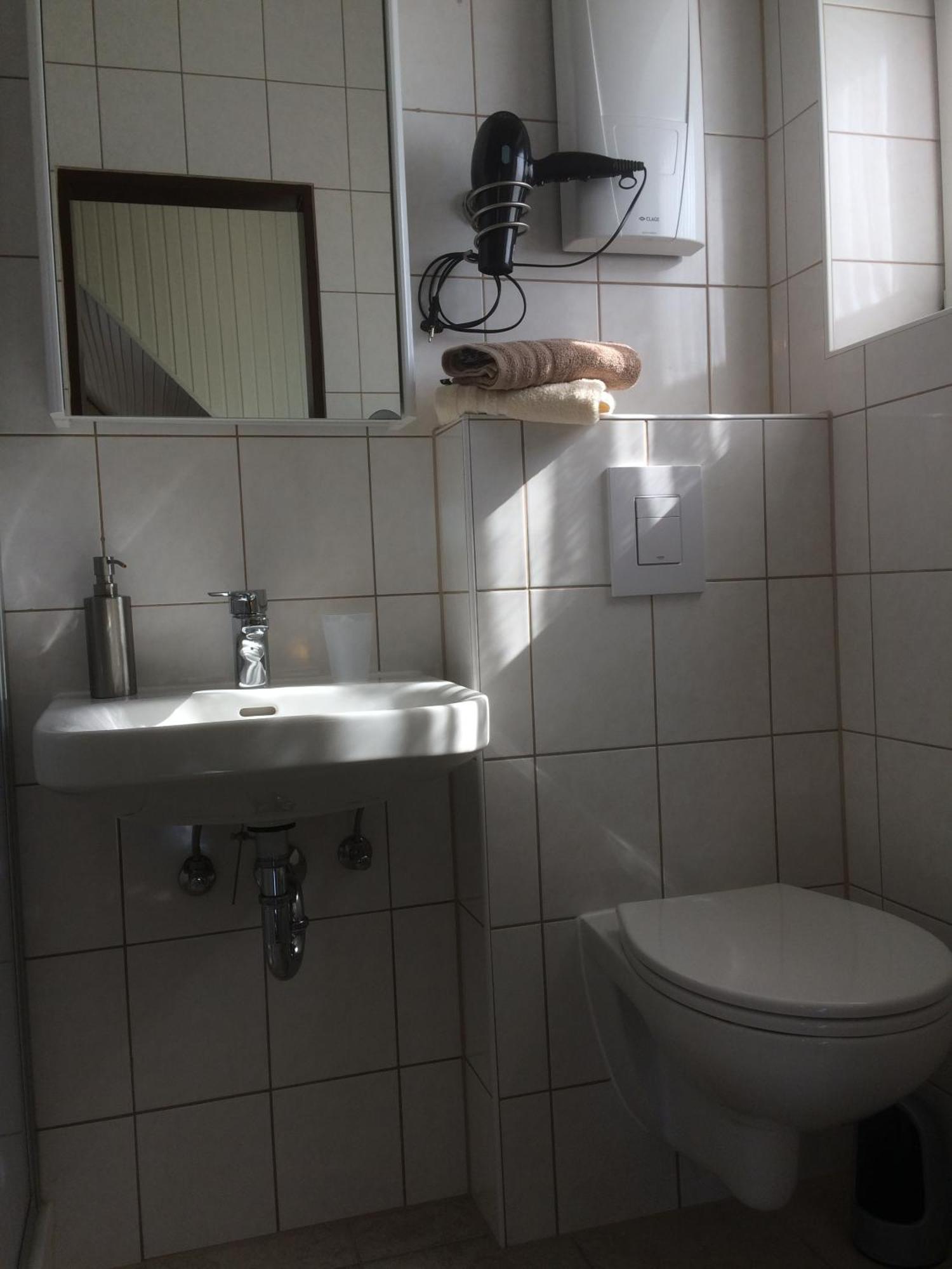 Huus Stoertebeker Acomodação com café da manhã Dornumersiel Quarto foto